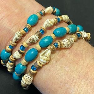 4 Shell, bone and wood bracelets
